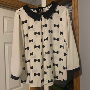 Black and white patterned blouse